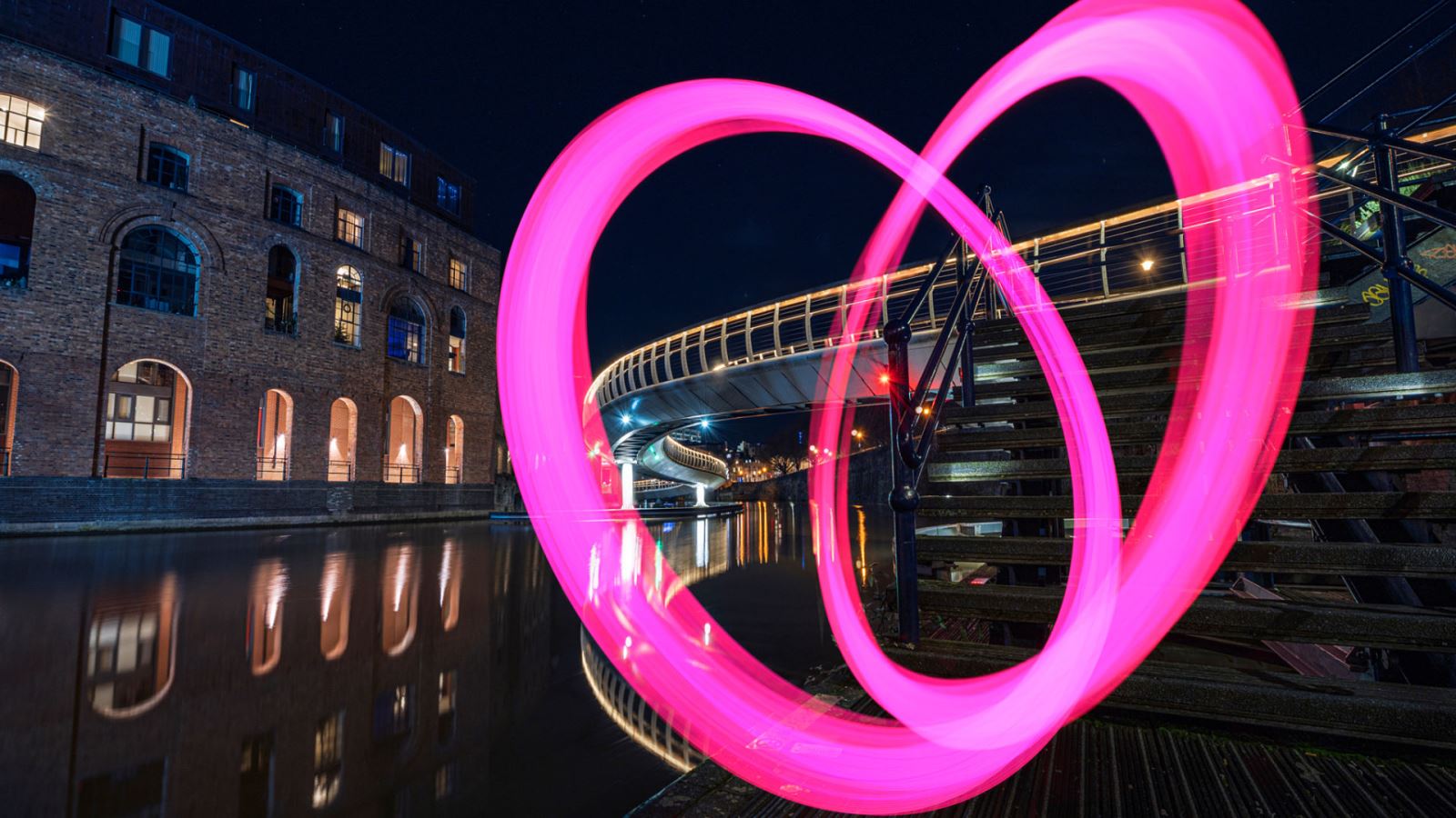 Bristol Light Festival 'light painted' pink heart in front of Castle Bridge in Bristol