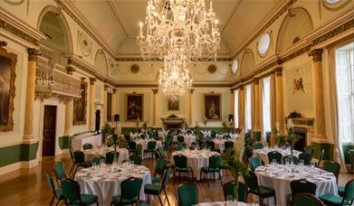 Tables and chairs in room