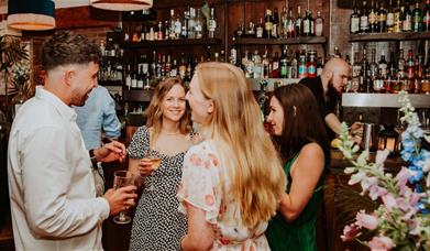 Berkeley Square - people standing with drinks