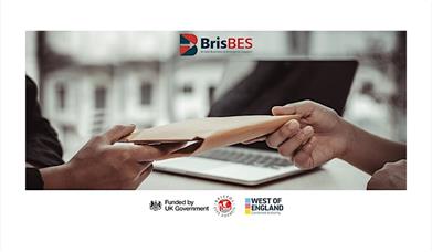 Hands exchanging an envelope