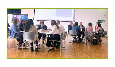 people sitting at a networking event