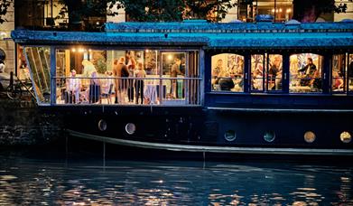 People celebrating on Glassboat