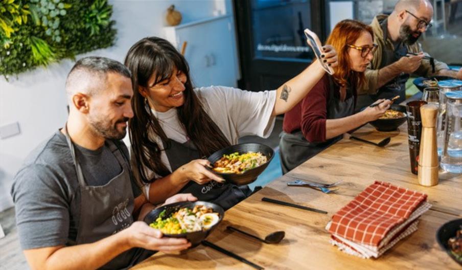 Group taking photo at class