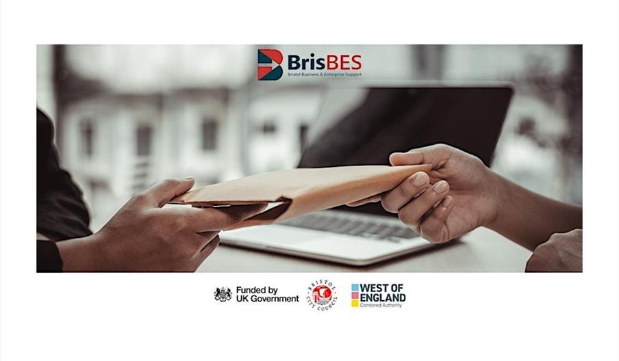 Hands exchanging an envelope