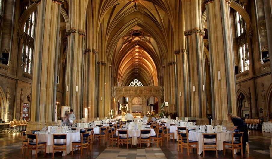 Bristol Cathedral interior empty round table banquet set up