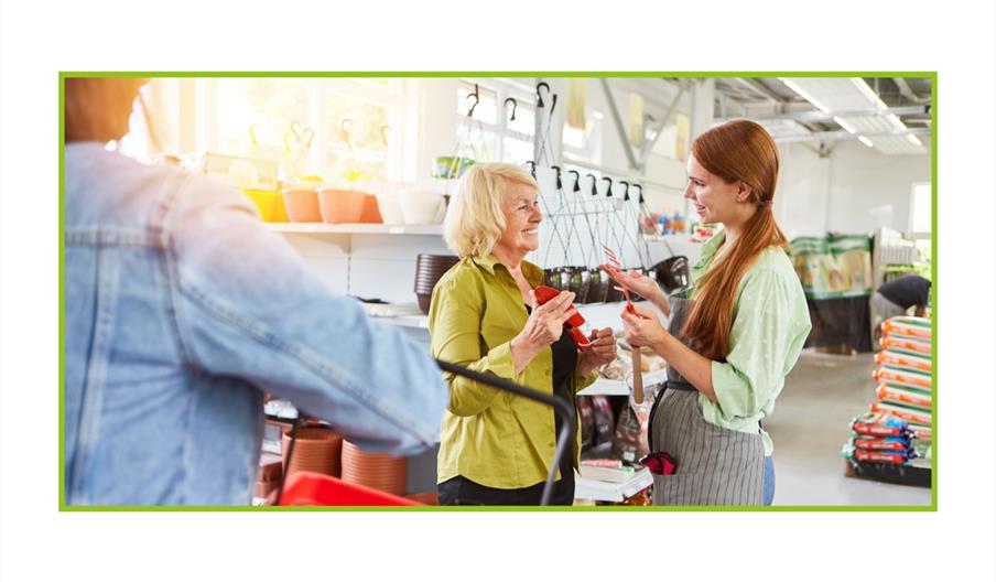 stock photo of people talking in a garden supply store
