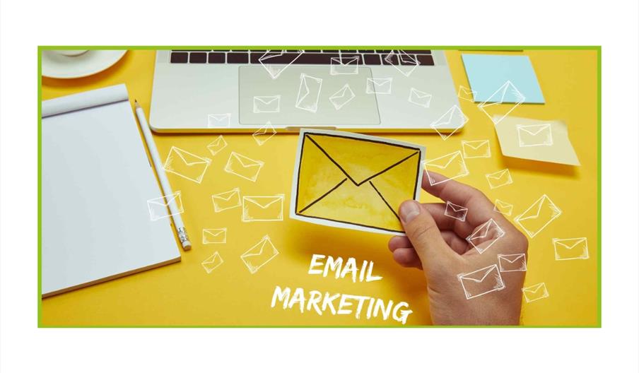 Stock photo of someone holding a drawing of an envelope