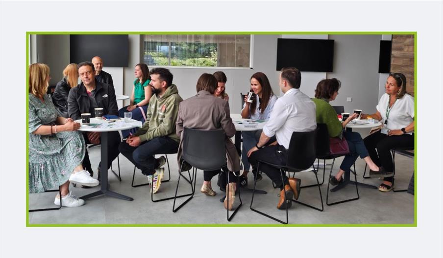 People sitting at tables talking