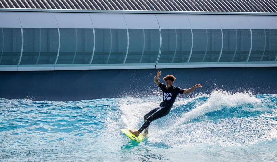 Person surfing at The Wave Bristol