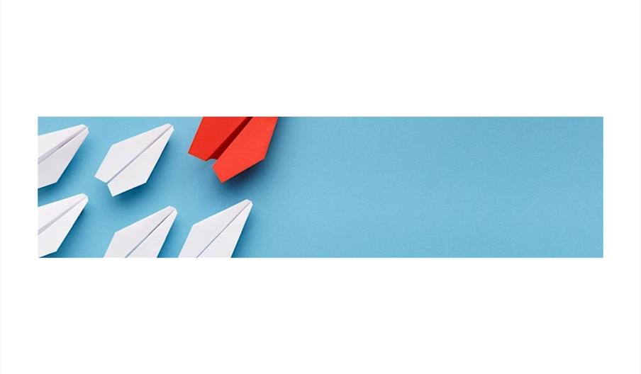 Paper airplanes on a blue background