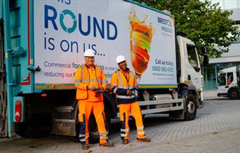 Bristol Waste Company waste management employees standing in front of their van.