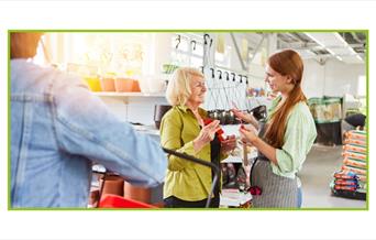 stock photo of people talking in a garden supply store