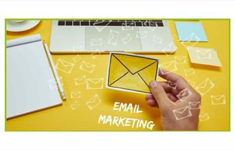 Stock photo of someone holding a drawing of an envelope