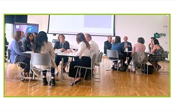 people sitting at a networking event