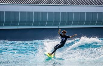 Person surfing at The Wave