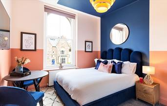 Bedroom with blue board