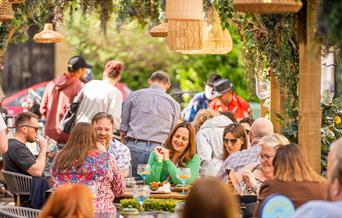 Guests having a cocktail outside