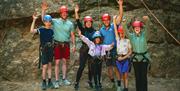 Family enjoying climbing