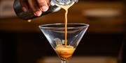 Pouring cocktail