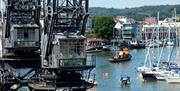 Cranes, Boat, and Harbour
