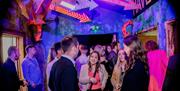 People enjoying a Christmas Party at Wake The Tiger