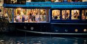 People celebrating on Glassboat