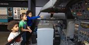 Children looking at concorde