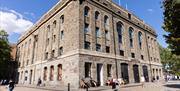Another exterior shot of the Arnolfini, this time from the ground and the corner near the harbour, so the shot is from an angle and looking up.