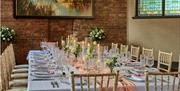Long table set for dining
