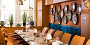 Glass room at The Bird with dining table