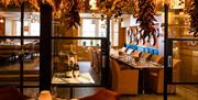 Glass room at The Bird with decorations