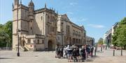 A group on the Blackbeard to Banksy tour outside Bristol Central Library