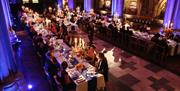 Bristol Cathedral Nave dinner with people seated