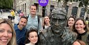 City Days group shot with statue on harbourside
