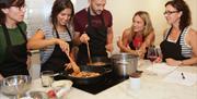 Learn to cook in Monica’s private kitchen at Cooking It!
