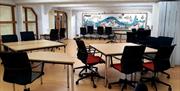 Seats and tables in room