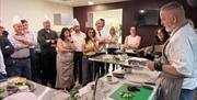 Corporate group in cooking class