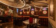 Table and chairs, with darts