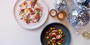 Dishes at a Christmas party and festive arrangements