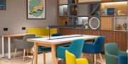 A lounge area on the ground floor adjacent to the dining area and the reception.