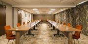 Conference room set up U shaped, from the perspective of the presenter