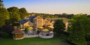 Exterior of the Homewood Hotel in Somerset at sunset