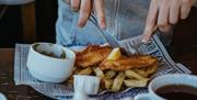 eating fish and chips