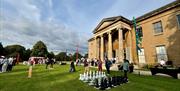 Leigh Court lawn with people playing games