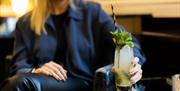Woman with a cocktail at Harbour hotel Bristol
