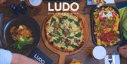 Ludo food, nachos and pizza