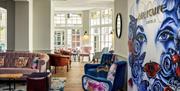 Hotel reception with bright furnishings