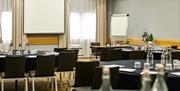 Conference room set up with round tables
