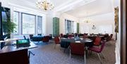 Meeting room with round tables.