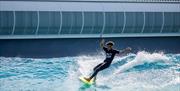 Person surfing at The Wave Bristol